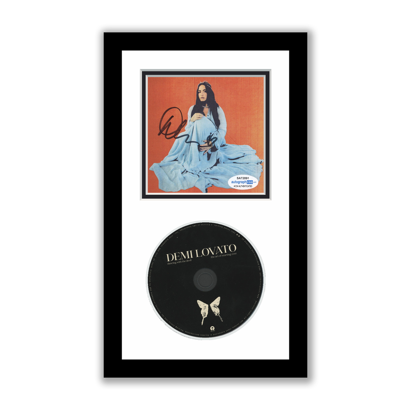 Item # 191687 - Demi Lovato Autographed Signed Framed CD Dancing With The Devil ACOA