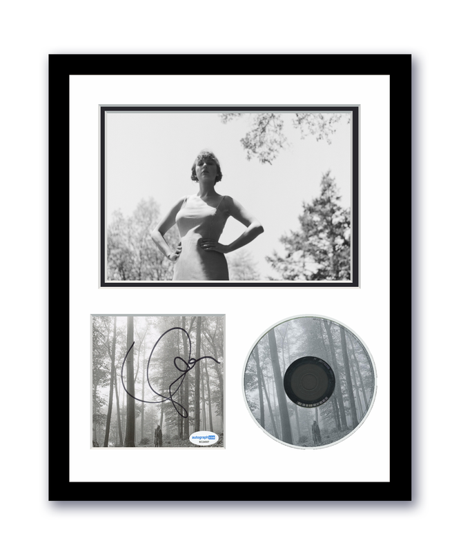 Item # 179567 - Taylor Swift Autographed Signed 11x14 Custom Framed CD Photo Folklore ACOA