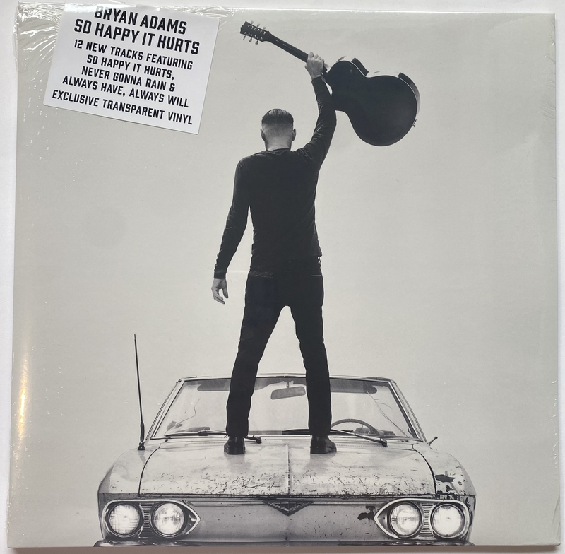 Item # 176327 - Bryan Adams "So Happy It Hurts" SIGNED 12x12 Album Insert + Sealed Vinyl LP