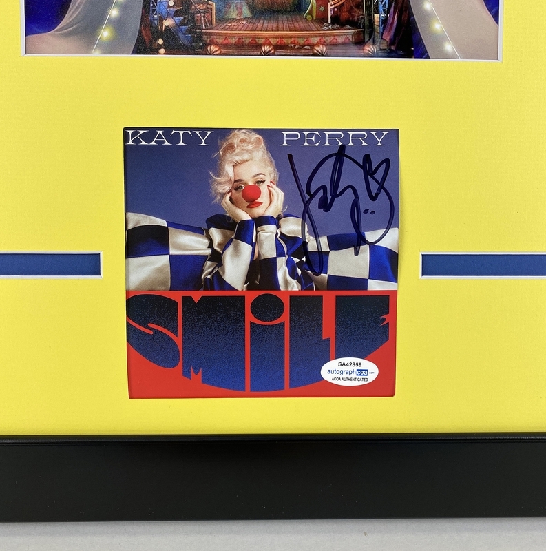 Item # 176426 - Katy Perry "Smile" AUTOGAPH Signed Photo Custom Framed 16x20 Matted Display
