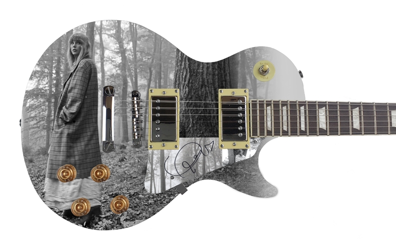 Item # 204874 - Taylor Swift Autographed Signed Electric LP Photo Folklore Guitar ACOA